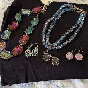 Necklaces and earrings.
